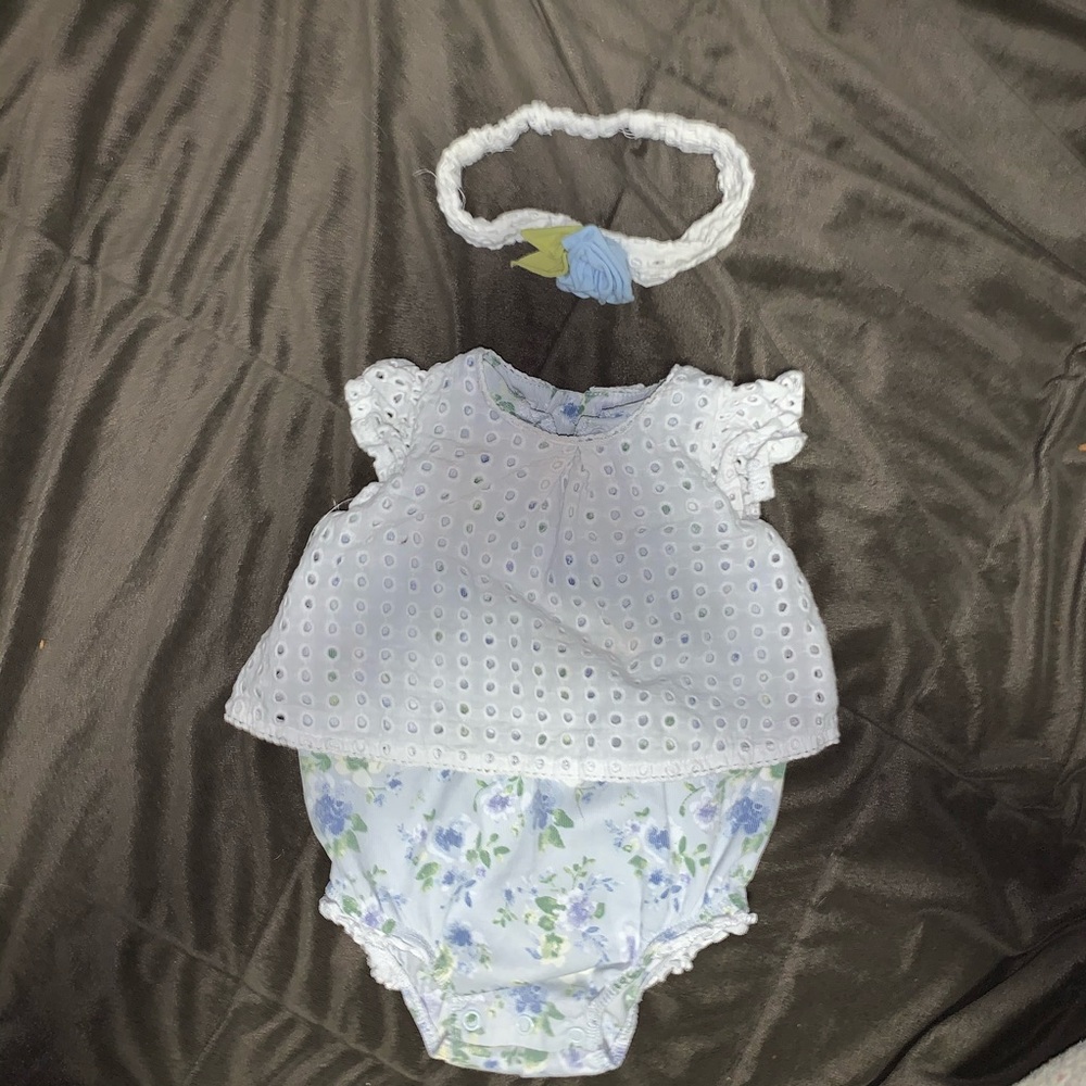 Blue floral onesie with white overlay